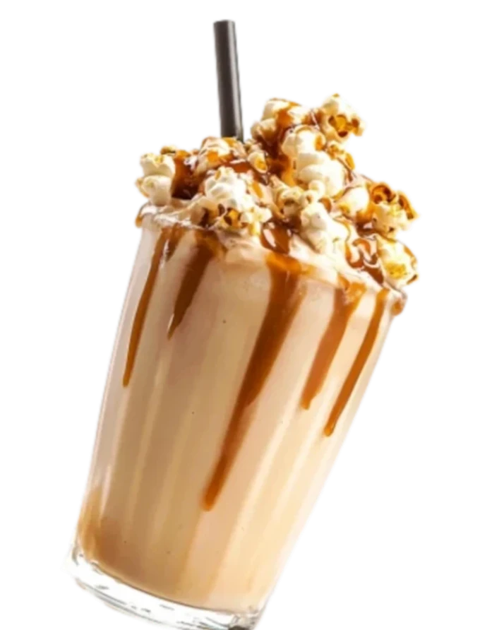 Milkshake gourmand avec garnitures et toppings flottants